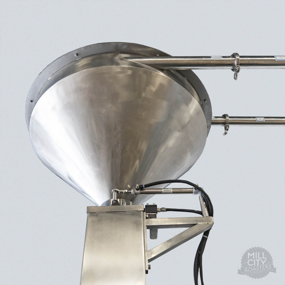 Automated pnuematic charging and all food grade stainless steel coffee path.