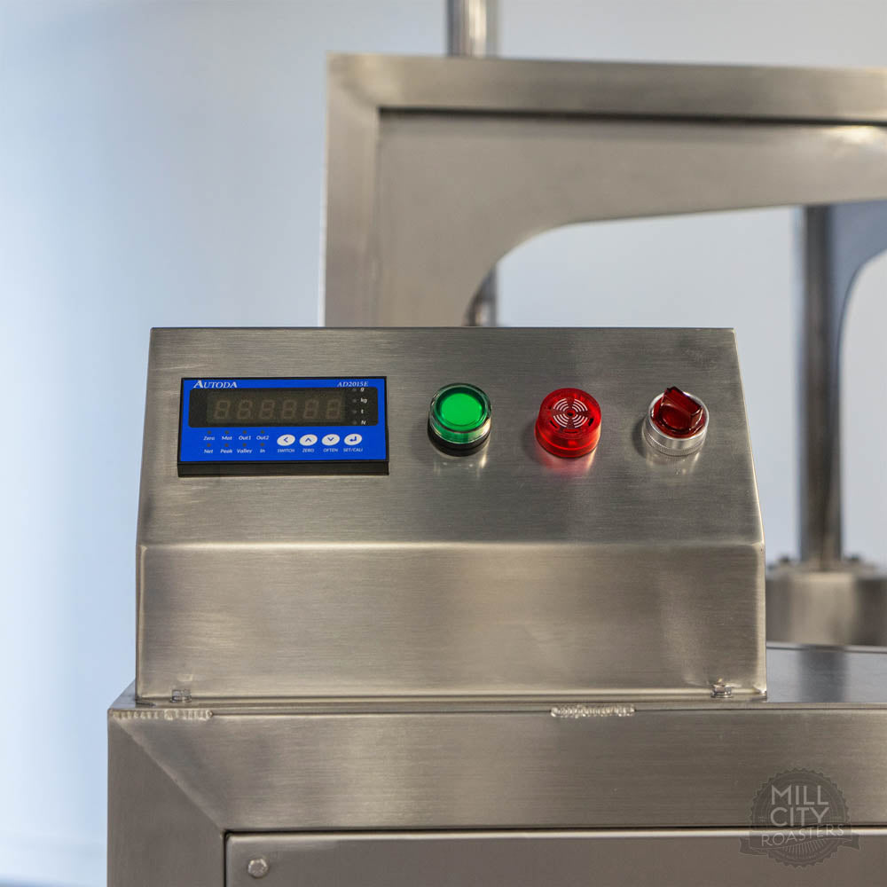 Programmable green coffee loader.