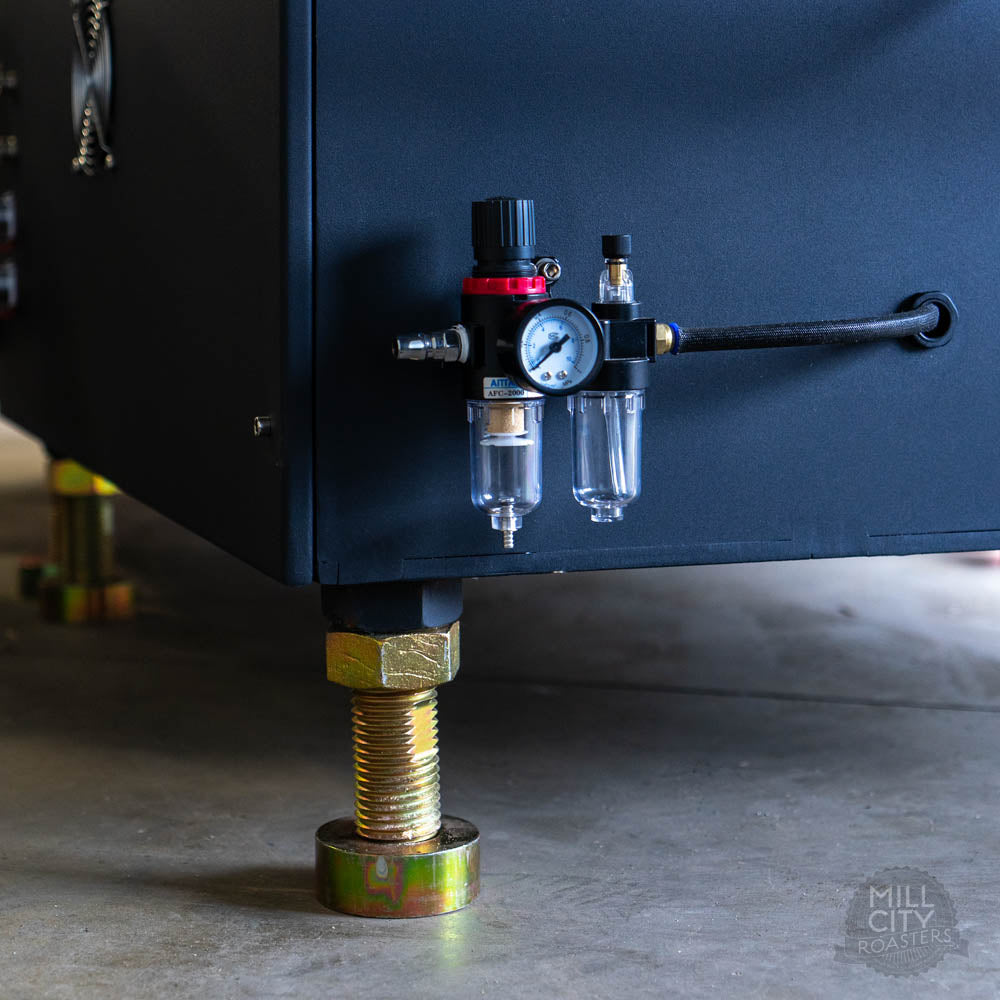 Large throw custom leveling legs and built in compressed air regulator, dryer and oiler.