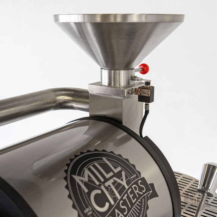 Charging chute sensor eliminates accidental mixing of green and roasted coffee.