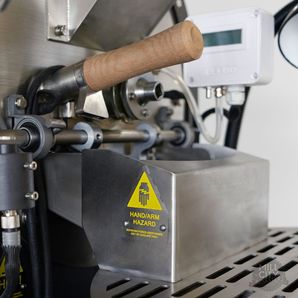 Smart cooling tray cover protects operator from injury.