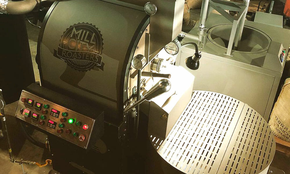 A Mill City Roasters 20 kilogram machine is turned on with the control buttons lit up